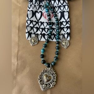 Excellent used condition. Brighton necklace and earring set.